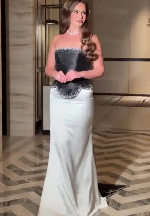 فستان سهرة اسود وابيض بتصميم كورسية